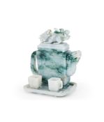 A Chinese jadeite teapot with tray and two cups