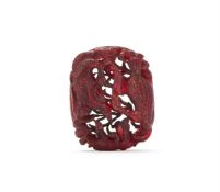 A Chinese carved amber belt buckle