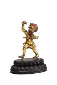 A Sino-Tibetan gilt bronze figure of Simhavaktra