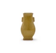 A small Chinese teadust-glazed vase