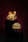 Two rare Chinese chased gold five-ridged headdresses