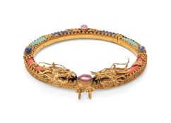 Y A Chinese gilt bronze and hardstone embellished collar ring