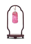 A Chinese carved pink tourmaline pendant