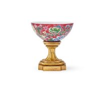 A small Chinese ruby-ground Famille Rose bowl