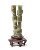 A Chinese celadon jade bifurcated 'chilong and duck' vase