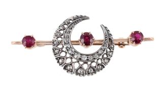 A LATE VICTORIAN DIAMOND AND RUBY CRESCENT BAR BROOCH