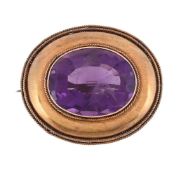 A LATE VICTORIAN AMETHYST BROOCH