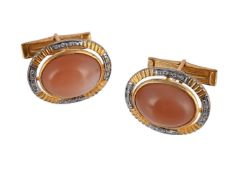 A PAIR SUNSTONE AND DIAMOND CUFFLINKS