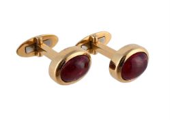 A PAIR OF RUBY CUFFLINKS