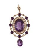 AN EDWARDIAN AMETHYST AND SEED PEARL PENDANT