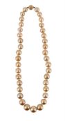 A GRADUATED SOUTH SEA CULTURED PEARL NECKLACE
