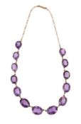 AN AMETHYST HALF RIVIERE NECKLACE