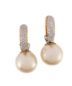 A PAIR OF DIAMOND AND FRESHWATER CULTURED PEARL EARRINGS