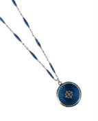 A BELLE EPOQUE ENAMELLED LOCKET PENDANT ON CHAIN