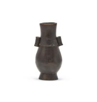 A Chinese small bronze hu vase
