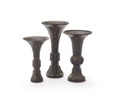 Two Chinese bronze flower vessels
