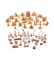 A group of twenty-seven Chinese boxwood carvings of street traders and figures
