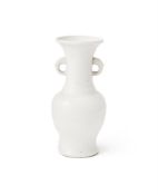 A Chinese dehua twin handled vase