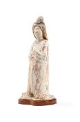 A Chinese pottery figure of a Court Lady