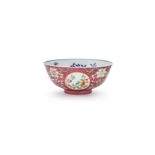 A Chinese ruby-ground famille-rose sgraffiato 'medallion' bowl