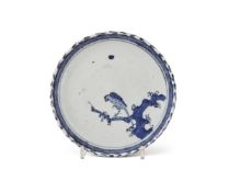 A Japanese Shoki Imari blue and white dish