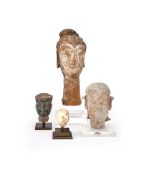 A Chinese bronze head of an official