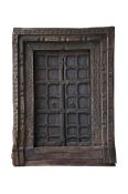 An impressive carved wood doorway