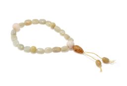 A Chinese jade pebble stone rosary