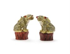 An attractive pair of Japanese Kakiemon type models of tigers
