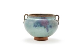 A Chinese 'Jun' purple-splashed twin handled jar