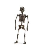 An Iron Jizai Okimono in the form of a Skeleton