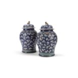 A large pair of Chinese vases and covers