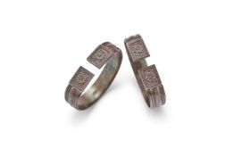 A pair of Chinese silver bracelets