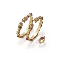 Two carnelian mounted gold coloured 'dragon' bracelets