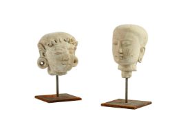 Two attractive Javanese tuffstone heads