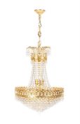 A GILT METAL AND GLASS SIX LIGHT CHANDELIER, MODERN