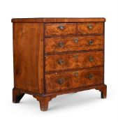 A QUEEN ANNE WALNUT AND INLAID CHEST OF DRAWERS, CIRCA 1710
