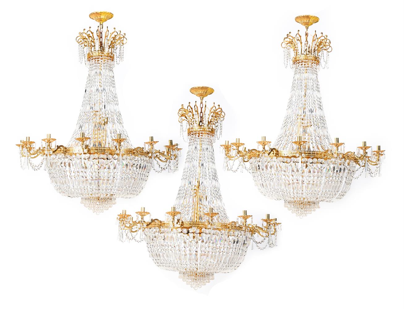 A SET OF THREE GILT METAL FIFTEEN LIGHT CHANDELIERS, MODERN