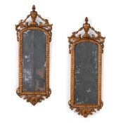 A PAIR OF CONTINENTAL CARVED GILTWOOD MIRRORS, LATE 18TH CENTURY
