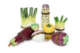 A COLLECTION OF SEVEN HAND PAINTED LIMOGES HINGED BOXES IN THE FORM OF FRUIT AND VEGTABLES, MODERN
