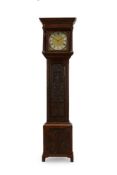 A CARVED OAK LONGCASE CLOCK, LATE 18TH CENTURY AND LATER