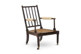 A VICTORIAN EBONISED BEECH BOBBIN-TURNED ARMCHAIR, MID 19TH CENTURY
