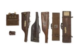 A CANVAS AND BROWN-LEATHER MOUNTED CARTRIDGE MAGAZINE, CIRCA 1900