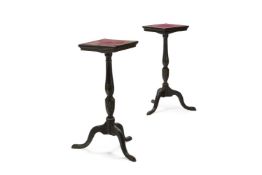 A PAIR OF GEORGE III BLACK AND WHITE JAPANNED STANDS, PROBABLY EARLY 19TH CENTURY