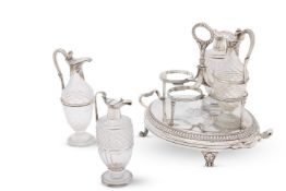 A GEORGE III SILVER OVAL TWIN HANDLED CRUET STAND, PAUL STORR