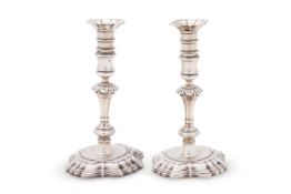 A PAIR OF GEORGE II CAST SILVER CANDLESTICKS, BENJAMIN GODFREY, LONDON 1738
