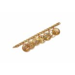 VAN CLEEF & ARPELS , A GEM SET CHARM BRACELET