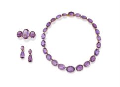 A FRENCH EARLY 19TH CENTURY AMETHYST NECKLACE, BROOCH AND EARRING SET