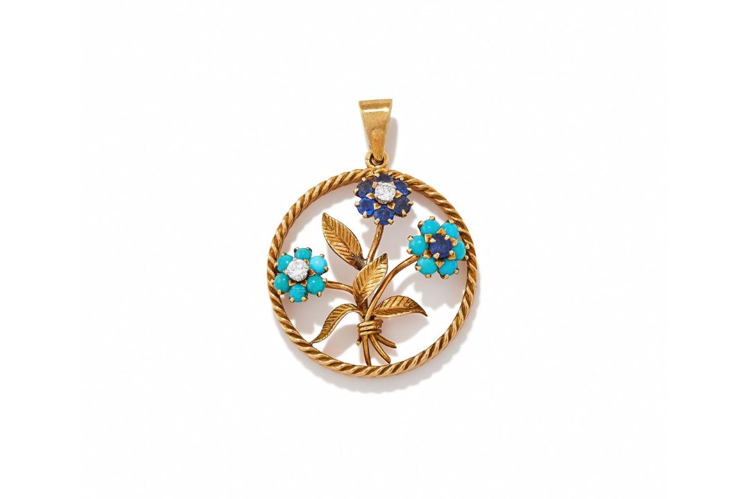 VAN CLEEF & ARPELS, A GEM SET CHARM PENDANT - Image 1 of 2