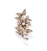 AN EARLY 20TH CENTURY DIAMOND FLOWER BROOCH